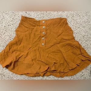 Orange skirt with shorts. Skort